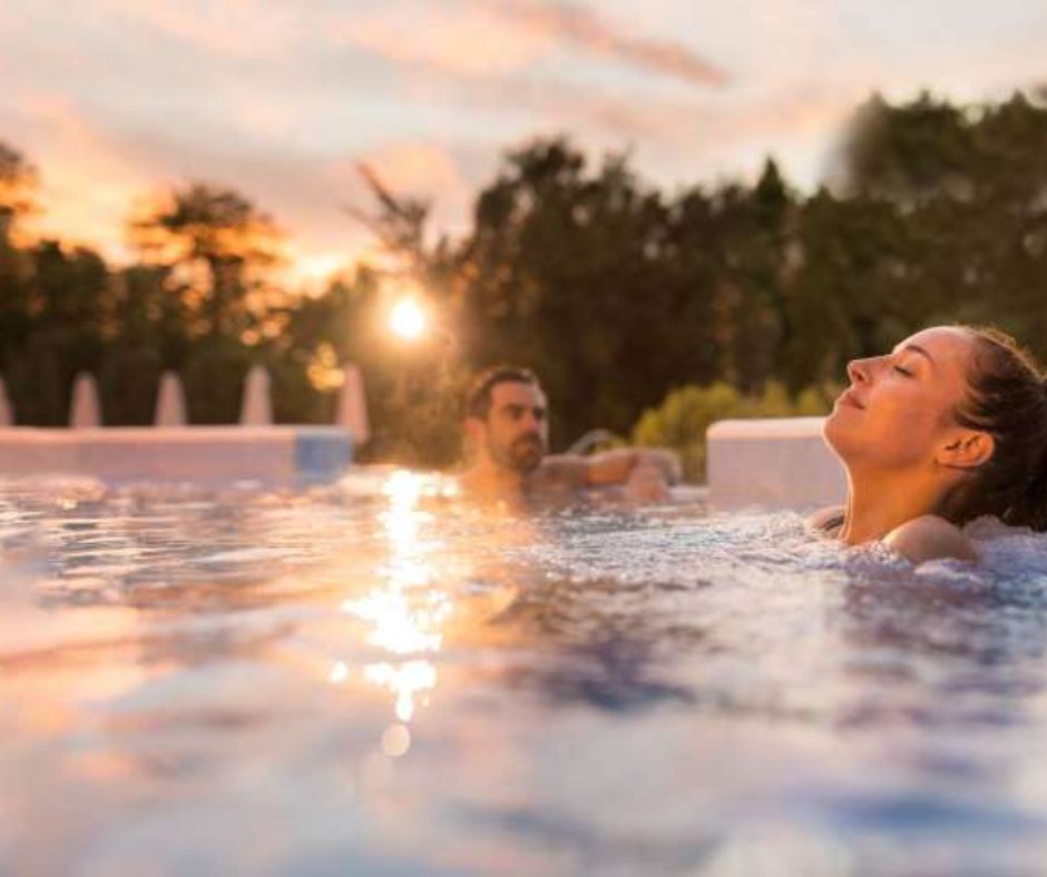 Relaxing thermal pool spa in New Zealand, showcasing natural hot springs and serene outdoor setting for rejuvenation and wellness, New Zealand group tour from Hyderabad