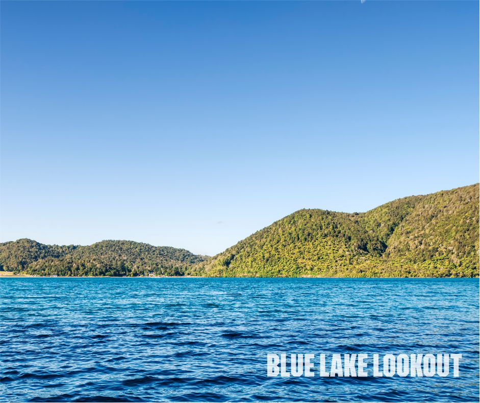 Blue Lake Lookout in New Zealand offering stunning panoramic views of crystal-clear water and surrounding landscapes, perfect for nature lovers and scenic photography, New Zealand group tour from Nashik