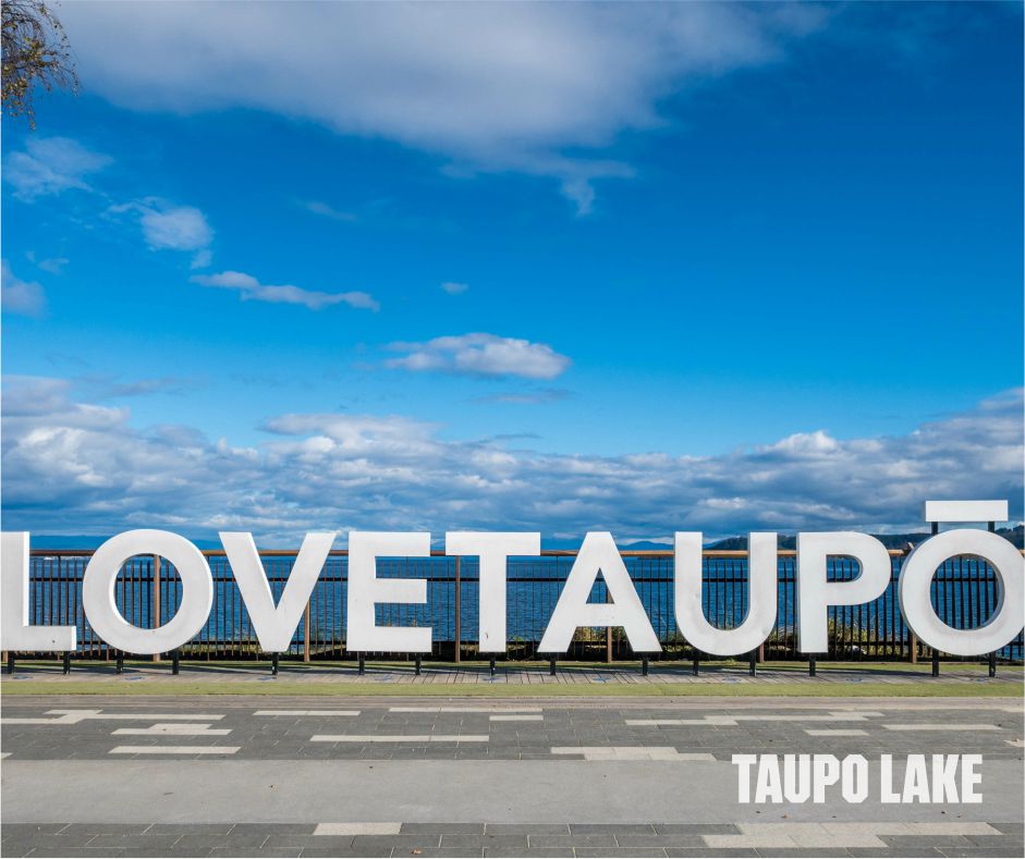Lake Taupo, New Zealand – Scenic view of the stunning freshwater lake surrounded by lush greenery and mountains, offering breathtaking landscapes and outdoor activities, New Zealand group tour from Pune